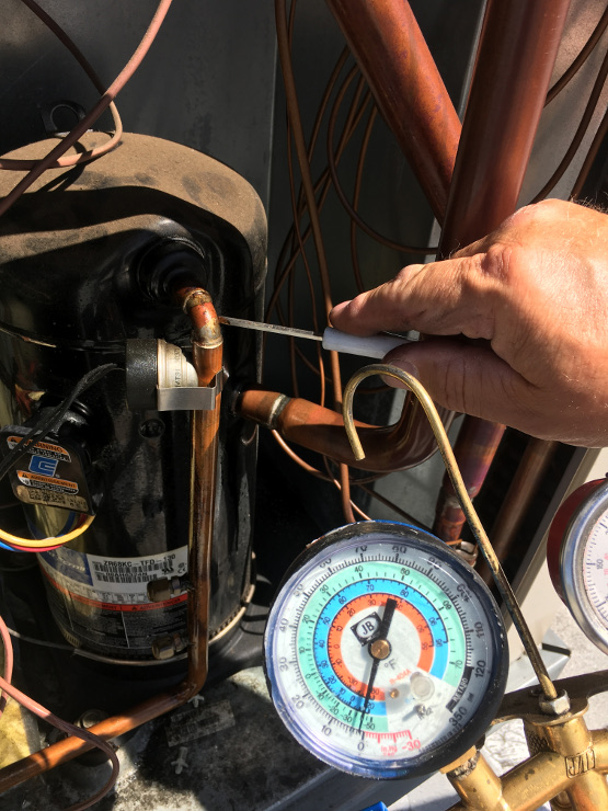 Air conditioning heat pump repair image